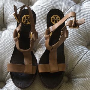 Tory Burch nude leather and wood platform heels.